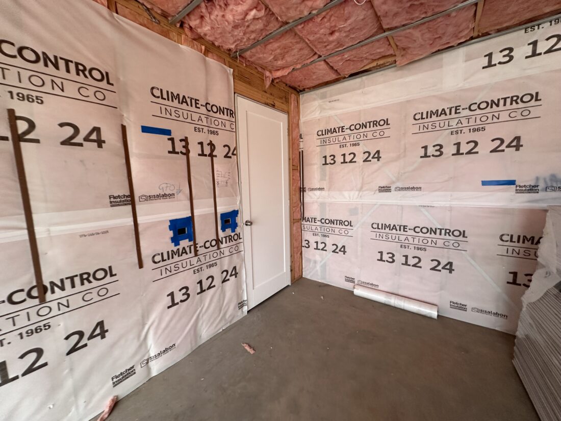 Home insulation Geelong job with Climate Control wall wrap installed over the timber frame and pink batts in the ceiling